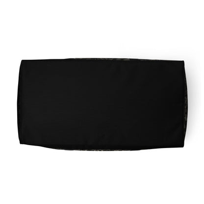 Top view of a black rectangular duffel bag with subtle camo accents on white background