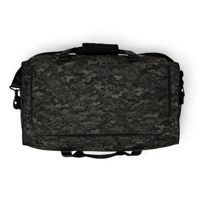 Black camo duffel bag with intricate crown and chain pattern, streetwear accessory